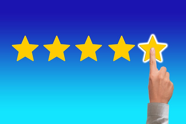 A hand selecting a five star customer review rating